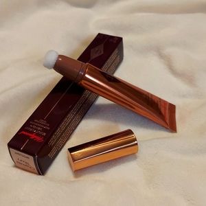 BEAUTY LIGHT WAND SPOTLIGHTCandlelit gold liquid highlighter